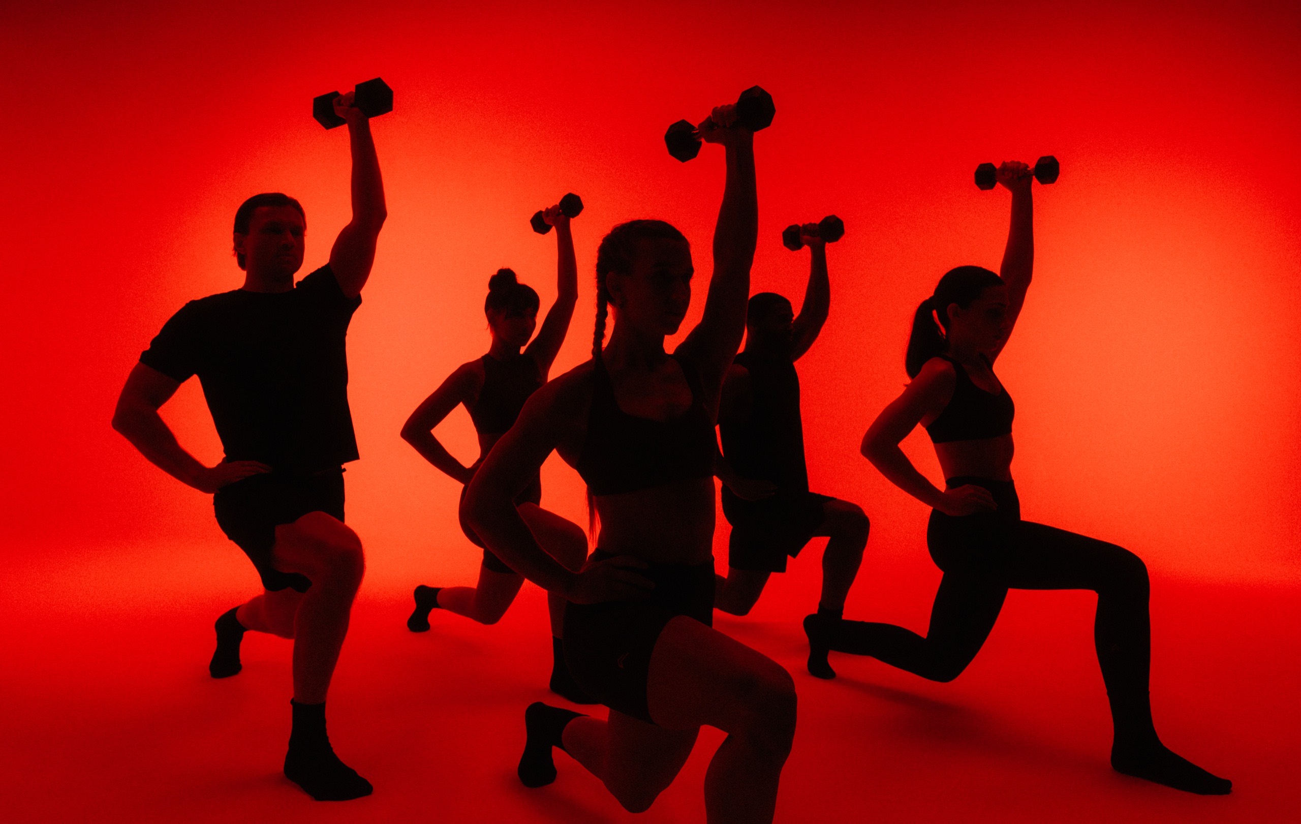 Group training with dumbbells at the Method26 studio